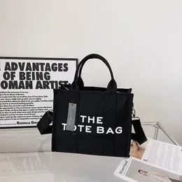Nouveau design sens sacs de soirée personnalité créative toile femme omnibus grande capacité main sac à bandoulière