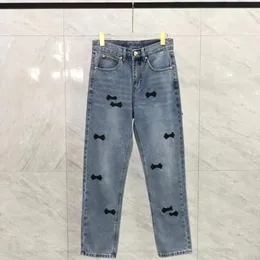 Designer heren jeans dames mode luxe slanke elastische merk zakelijke broek broek klassieke stijl mannelijke denim vrije tijd metaal tag street trend