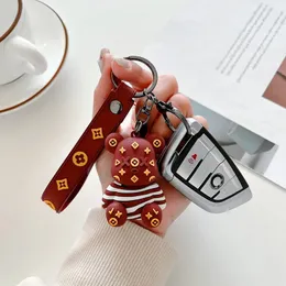 Cute bear designers keychains men and women cute bear keychain couple ins car doll doll key chain charm good