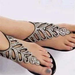 Sandaler Sexiga damer bling Crystal Heart Thong Toe Fashion Leafs Form Rhinestone Flat T-Strap Beach Sandalias