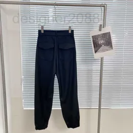 Pantaloni da donna Capris designer La nuova tuta casual decorativa con etichetta in pelle triangolare è bella con una cintura in vita e un design alto 0YX3