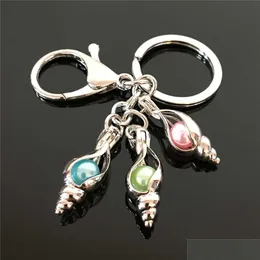 Keychains Lanyards Pearl Cage Key Ring In Europe And America Can Open Keyring With Hollow Noctilucent Volcanic Stone Pendant Drop De Dh1Od