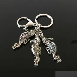 Keychains Lanyards Euramerican Seahorse Pearl Cage Nyckelring kan öppna ihåligt noctilucent vulkanisk stenhänge Keyring Drop Delivery Dhieu