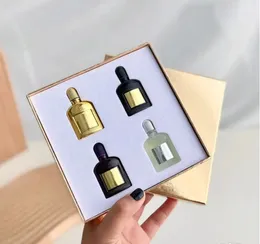 Fabrika Doğrudan Kadın Erkek Parfüm Hediye Setleri 4*10ml Siyah Orkide Gri Vetiver Altın Mor Şişe Kadife Orkide Parfum Uzun Kalıcı Koku 4in1 Kit