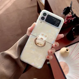 Glitter drömskal marmorfodral för Samsung Galaxy Z Flip4 Flip 3 4 5G Diamond Bracket Holder Conch Pattern IMD Silicone Cover