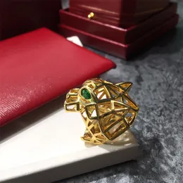 Bandringar toppkvalitet Hyperbole Green Eye Crystal Stone Vakuumpläterat guld rostfritt stål Leopardring för män kvinnor mode smycken 230224