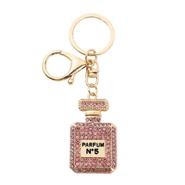 Crystal Perfume Bottle Keychains For Women Fashion Diamond Bow Metal Key Chain Car Bag Pendant Small Gift Jewelry Accessories