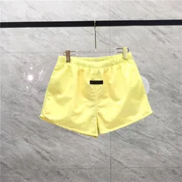 23ss verão europa praia shorts mulheres homens bordados reunidos logotipo nylon calças médias jogging calças curtas