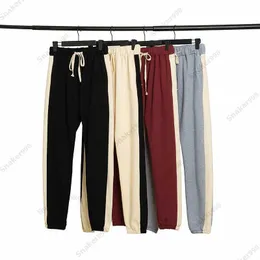 2023 Uomo Autunno Inverno Moda Pant Donna Mans High Street Silicone Lettere Stampa Pantaloni Mens Pantaloni sportivi essenziali Coppie Hiphop Casual Marca