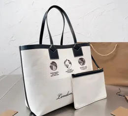 Bolsa de compras de lona branca Pacote de grande capacidade Bolsa bolsa de bolsa de alta qualidade Carta de retrato de moda Letra de couro genuíno Ralha interior