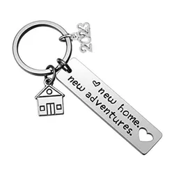 2023 مصنوعة من الفولاذ المقاوم للصدأ Housewarming Keychain قلادة العائلة أحب مفاتيح مفاتيح المنزل الإبداع ديكور الأمتعة keyring 12*50mm