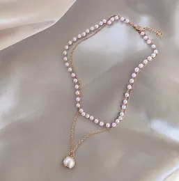 La catena semplice di nuovo modo borda la collana del pendente della perla della collana a più strati