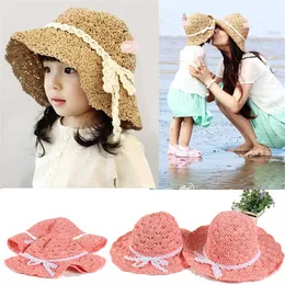 Geniş Memlu Şapkalar Koreli Versiyon Bebek Kız El Yapımı Bow Straw Hat Ebeveyn-Çocuk Balıkçı Kapağı Çocuk Seyahat Gölgesi G230227