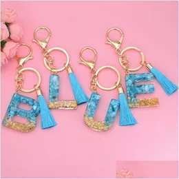 Ключевые кольца мода английская буква буквы с кисточкой синей аз -keyring блески блесток заполнения смолы цепные подарки аксессуары Del dh5er