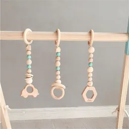 3pcs Set Wooden Pendant Baby Play Gym BPA Food Grade Wooden Teether Toys Interactive Baby Birth Gift Po Props 2010172741