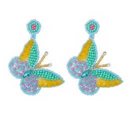Pendientes de diseño de moda estilo festivo hechos a mano DIY acabado arroz perla lentejuelas Animal mariposa pendientes