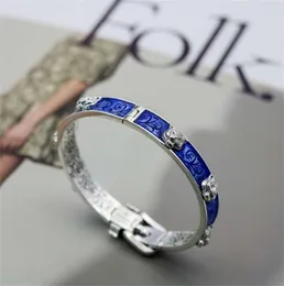 Designer smycken armband halsbands ring av hög kvalitet qi personlighet blå emaljhuvud sammanlåsande bälte par armband