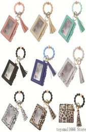 Fashion PU Leather Bracelet Wallet Keychain Party Favor Tassels Bangle Key Ring Holder Card Bag Silicone Beaded Wristlet Keychains1231181