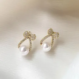 Fashion Bow-Knot Pearl Stud örhängen för kvinnor Lady Girls Temperament Korean Söta örhängen Engagemangsmycken gåva