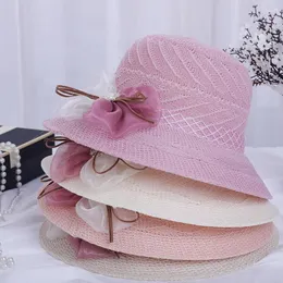 Sombreros de ala ancha Sombrero de paja Mujeres Protección solar Playa Malla Flores Bowknot Gorra Casual Damas Flat Top Elegante