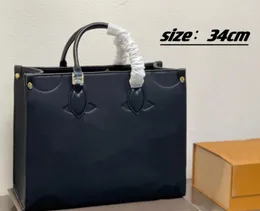 GOトートGMバッグの100％カウハイド女性クラシック本物のレザーリリーフ彫刻ハンドバッグ高級デザイナーバージョントートショッピングバッグクロスボディバッグ25 34cm