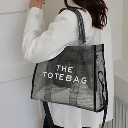 2023 Ny lyxdesigner Tygväskan Kvinnor Transparent handväska Messenger Shopping Bag Vacation Beach Bags Sac A Main Femme