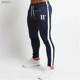 Hot Sale Solid Casual Mens Casual Slim Fit Tracksuit Sports Solid Male Gym Bomull