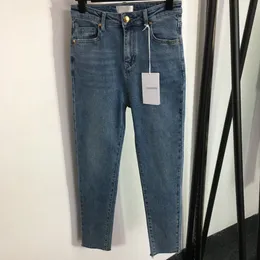 Designer mager jeans kvinnor nya mid-hög midja raka joker jeans lotus lövbyxor ben mode brev dekoration fritid