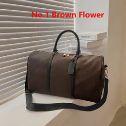 Luxury Men Kvinnor duffle högkvalitativ rese Duffel Bag Brand Designer Bagage Handväskor med lås Stor kapacitet Sportväska storlek 54 cm 885