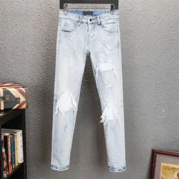 Nya män jeans och byxor designer svart snäv klistermärke Lätt tvätthål Motorcykel Rock Revival Joker Jeans