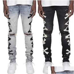 Mäns jeans herrar benmönster jean hombre motorcykel höst streetwear rippade noir homme blixtlås byxa för män droppleverans kläder dhoox