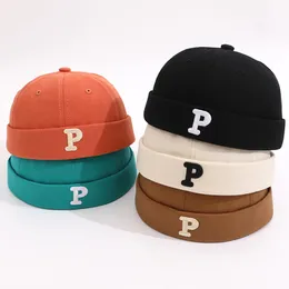 Nya bokstäver tryckt baby brimlös hatt solida färg pojkar flickor hip hop caps harajuku cool justerbara barn beanie hattar