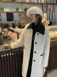 Miscele di lana da donna Designer high-end autunno inverno sale stile pigro di media lunghezza silhouette design lana lungo cappotto di pelliccia 1Y00