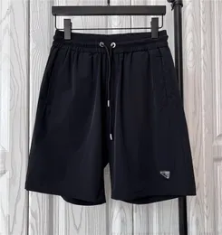 23 New Summer P Triangle Standard Shorts Men Draw Rope Letter 5 쿼터 바지 스포츠 바지 캐주얼 바지