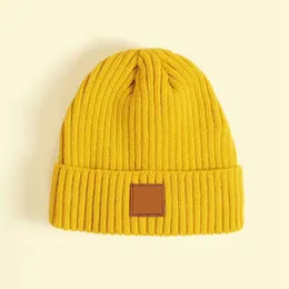 79129 Estilista dos EUA Gorro de malha de inverno CH Gorro de lã de malha vertical de inverno Unissex Dobra Gorros casuais Chapéu 5 cores Top Qua216m