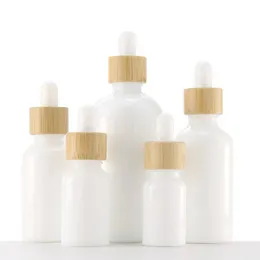 Bottiglie di olio essenziale di vetro di porcellana bianca Flacone contagocce per siero per la cura della pelle con pipetta di bambù 10ml 15ml 20ml 30ml 50ml 100ml Wvwwd