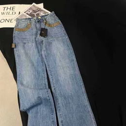 Kvinnors jeans designer 2023 sommar ny pendling mångsidig färsk och lekfull kombination läder tofs kant rakt ben nrvg