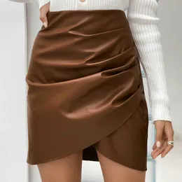 Skirts Artificial short leather sexy wrapped buttons pleats high waist irregular hem ultra-thin summer women's skiing Falda G220606
