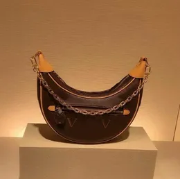 Vergoldete Schultertasche mit Schlaufe, Halbmondform, Designer-Handtaschen, Geburtstagsgeschenke, Design mit externem Reißverschluss, spezielle Clutch. Die Tragetasche sieht gut aus