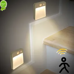 Nuova luce notturna a LED Sensore di movimento Luce per armadio Lampada decorativa da parete a batteria per l'illuminazione dell'interno del guardaroba del corridoio