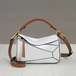 Taschen Abendessen Taschen 2023 neue Spleißleder trendige Ming Xi gleiche geometrische Tasche Damen Cross Body Frachtbrief Schulterkissen