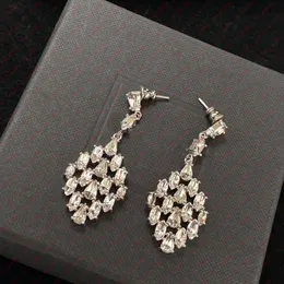 Luxurious rhinestone leaf dangle earrings for women. Brand Classic Wedding Bridal Gifts Designer Earrings Jewelry.