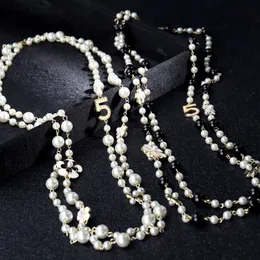 Naszyjniki wisiorek Wysokiej jakości kobiety długie wisiorki warstwowe kołniery naszyjniki perłowe de moda kwiat biżuteria 230617
