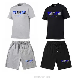 Diseñador de ropa de moda para hombre Chándales Camisetas Camisetas Camisas Pantalones cortos Camiseta de verano Conjunto de pantalones cortos Trapstar Carta Impreso Algodón Manga corta Conjunto de 2 piezas Casual Hombres Roc