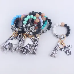 Party Favor Silicone Cow Bead Armband Wood Disk Armband Keychain Cow Tassel Ox Head Wrist Key Ring Charm Pendant Accessories Q219