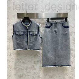 Двухцветные дизайнерские юбки 23SS Set Womens Clothing Water для выполнения старого винтажного короткого джинсового жилета с родом с волосами с высокой талией.