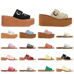 Platforma modowa Espadrille klin Woody Sandals Słowe kobiety designerskie kapcie autobus haftowane lniane płaskie mokasyki mokry suldery wewnętrzne buty plażowe zjeżdżalnia