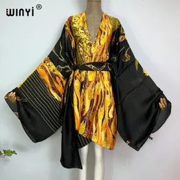 Podstawowe sukienki swobodne wina bohemian drukowane bikini ukryte eleganckie samozwańcze sukienki kimono sukienki letnie ubranie wakacyjne sukienka plażowa pokrowce 230620