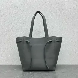 The new women's handbag features a classic drawstring shopping bag with a soft full leather body that can change various shapes! ultra-large capacity