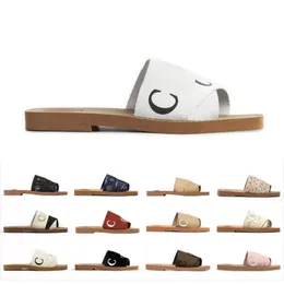 Tasarımcı Kadınlar Odunlu tıkanma sandal terlikleri yaz lastik sandalet plaj kaydırıcıları scuffs kapalı ayakkabılar moda tuval çapraz dokuma açık gözetleme ayak düz gündelik taklit